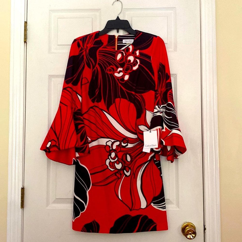Beautiful brand new CK dress nice for cocktails, parties for any season